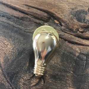 Bright idea lapel pin